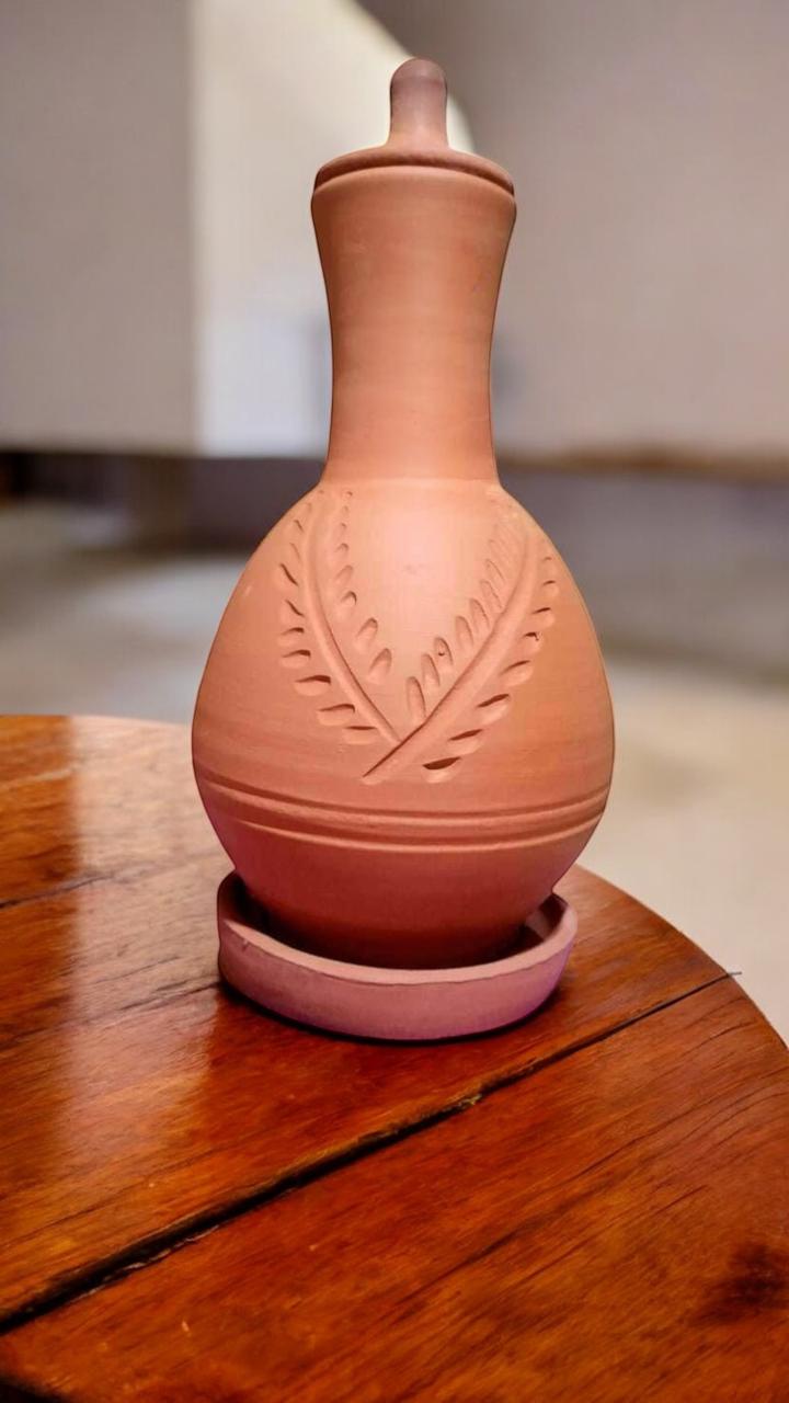 Nile Carve — Hand-Etched Clay Water Jug